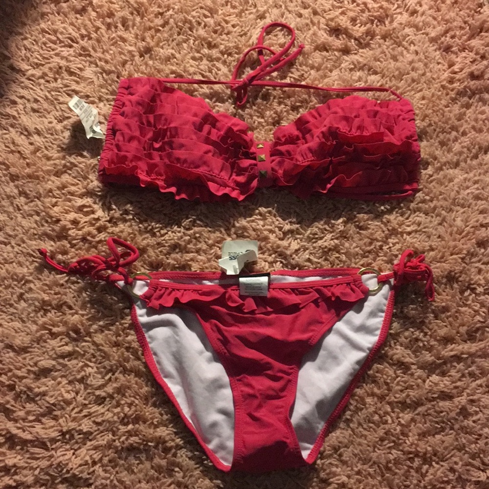 Ruffled pink bikini top and bottoms. NWT